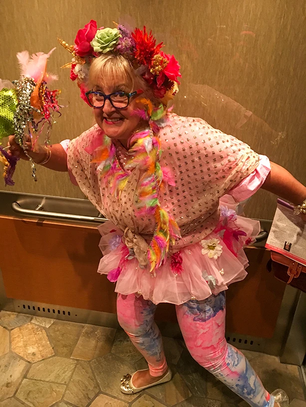 MC posing for a photo in an elevator